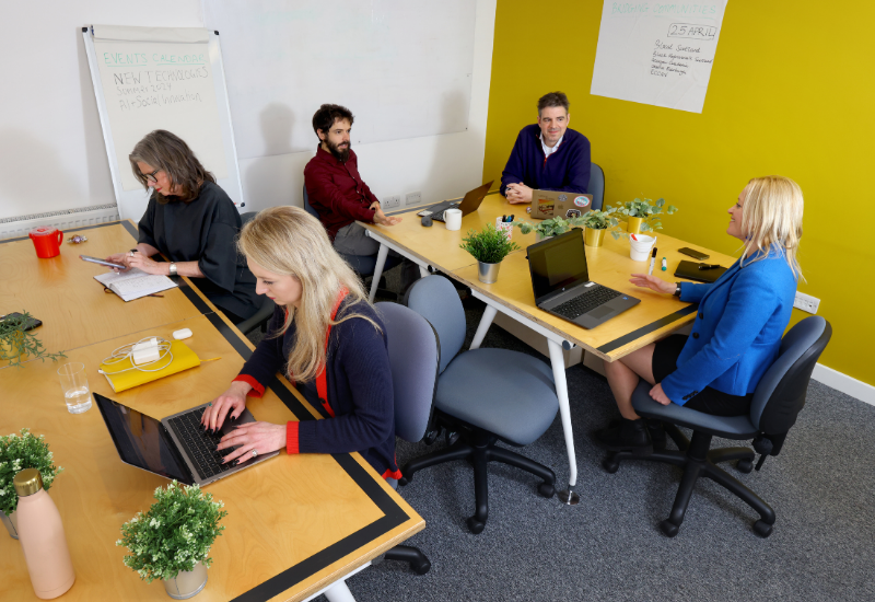 The Melting Pot's private office with 5 coworkers in the space